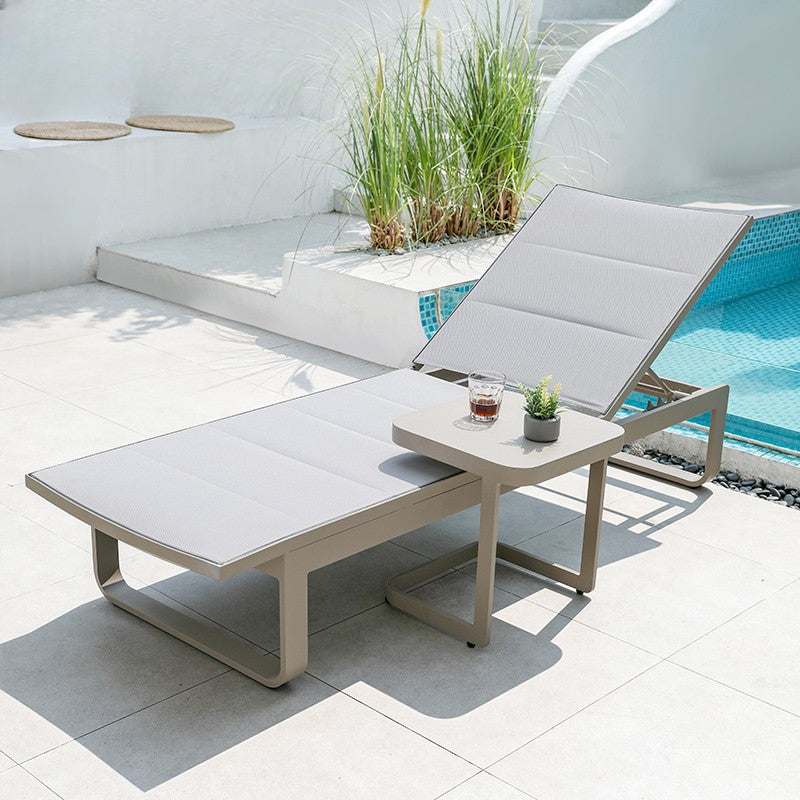 Waterproof chairs on the beach by the swimming pool garden