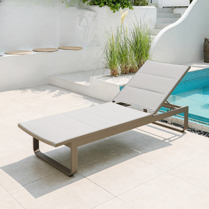 Waterproof chairs on the beach by the swimming pool garden