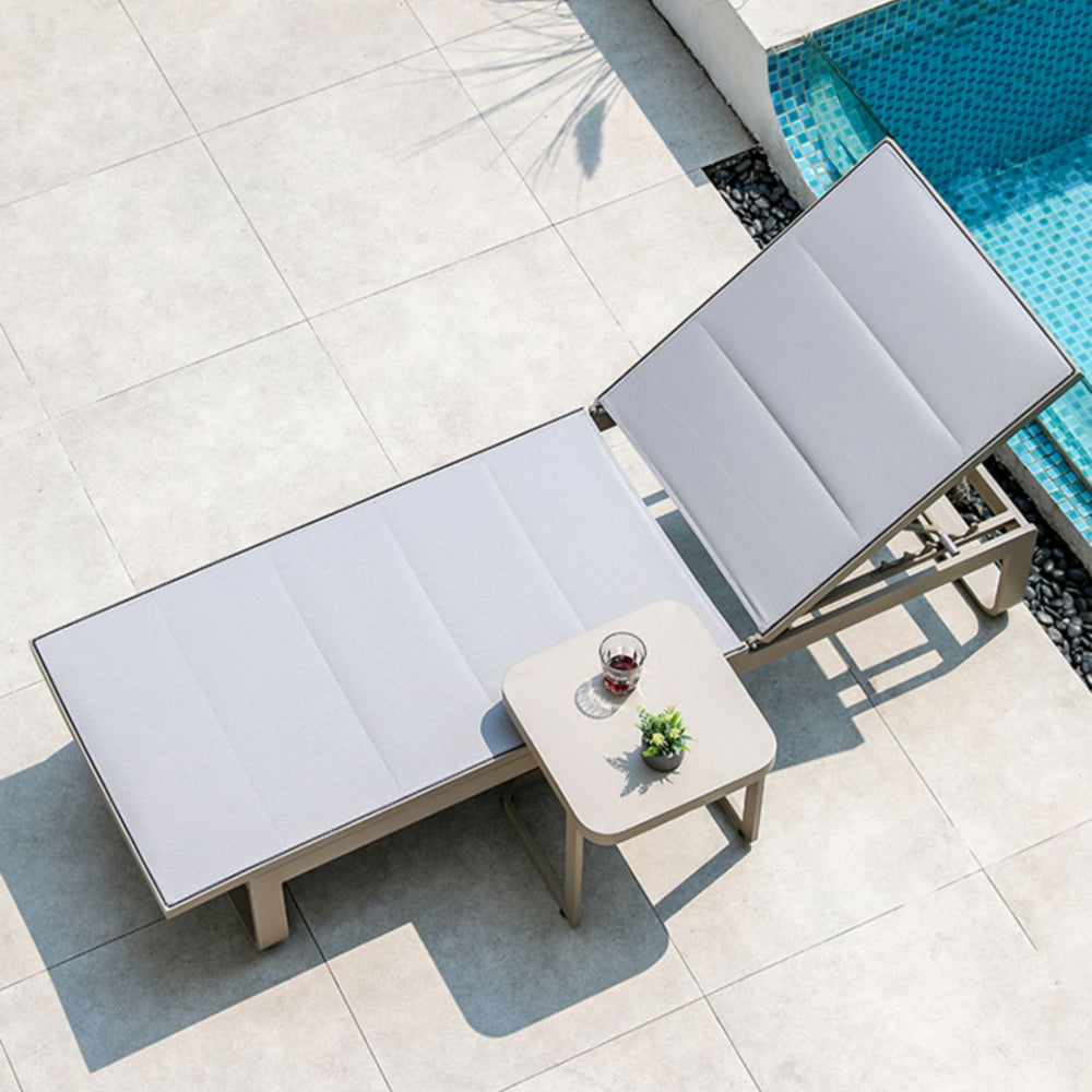 Waterproof chairs on the beach by the swimming pool garden