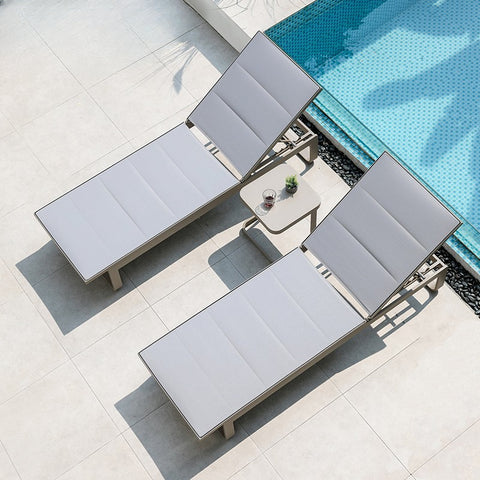 Waterproof chairs on the beach by the swimming pool garden