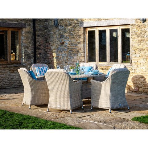 Sandstone Rattan 6 Seat Elliptical Dining Set with Parasol & Basegarden