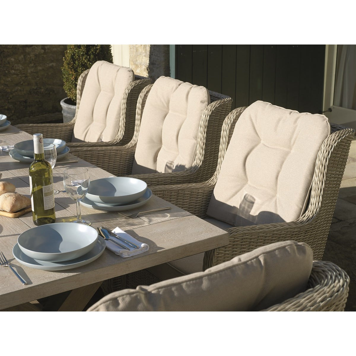 Sandstone Ceramic Rectangle Table with 8 Rattan Armchairsgarden